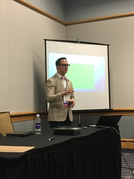 Christopher Burns presenting at a conference